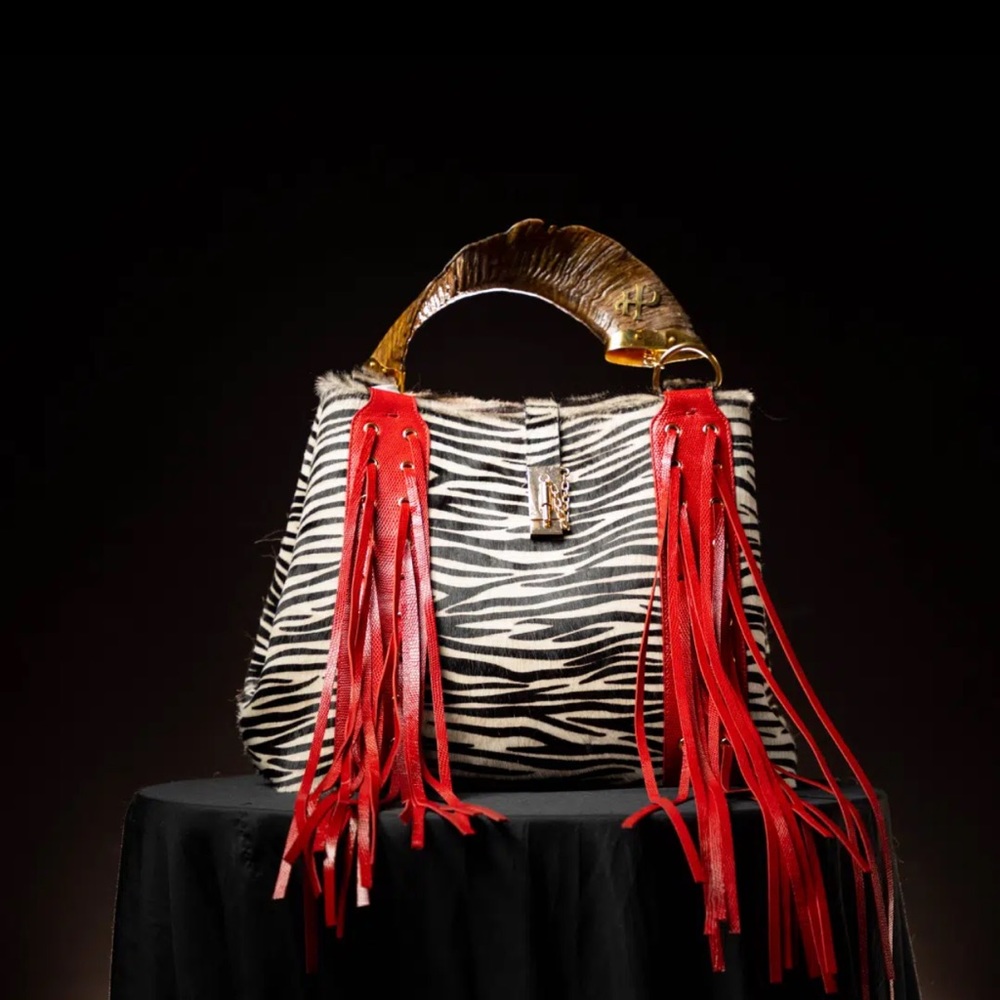 Luxury handbag Exterior, zebra print ponyhair. Interior leapard print ponyhair